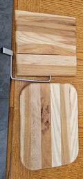 Cheese slicing board with bonus meat slicing board